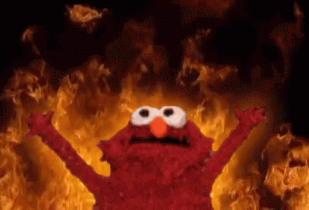 Elmo in front of Fire